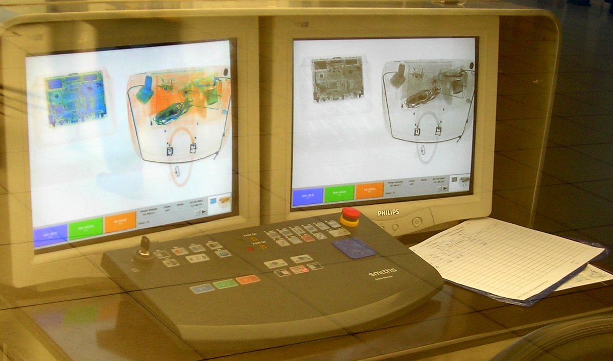 X-ray screening monitors showing scanned parcels
